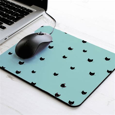 A magnifying glass. . Keydoc mouse pad